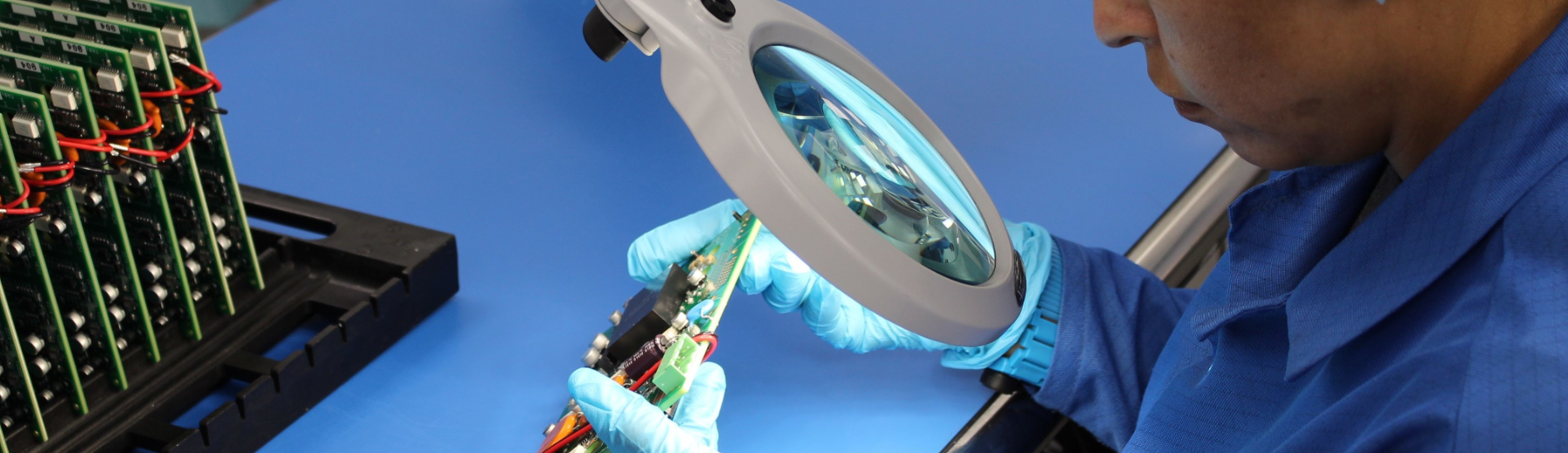 Woman looking through microscope