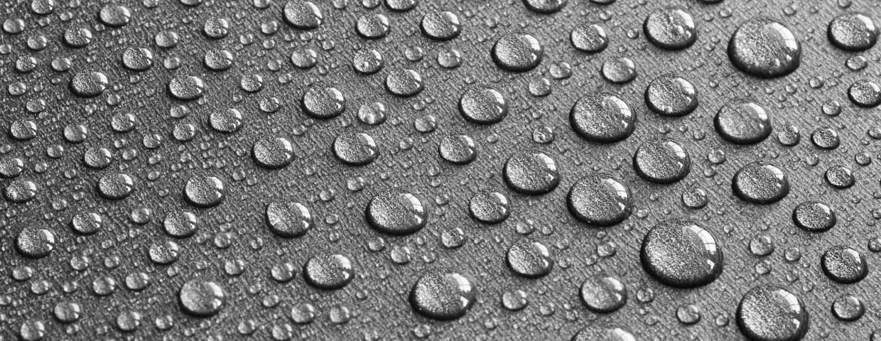 water droplets on a gray surface