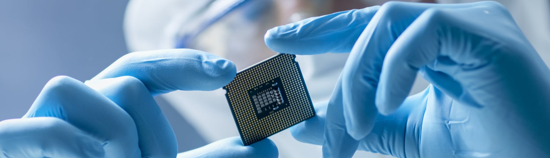 scientist holding microchip